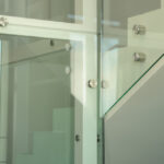 Stainless steel standoff glass railing